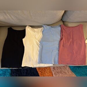 Lot of 4 fitted high neck tanks sz s